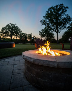 Avon Oaks Country Club Stone Patio and Fire Pit Designed and Installed by Ground Works
